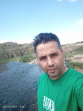 علی آموزگار
